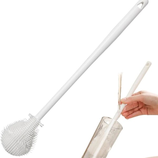 The Silicone Long Handle Cleaning Brush is the perfect solution for cleaning hard-to-reach areas inside mugs, bottles, cups, and other deep containers. Made from soft yet durable silicone bristles, it effectively removes residue without scratching delicate surfaces. Its long ergonomic handle provides a comfortable grip and allows easy access to the bottom of deep mugs and bottles. The flexible silicone bristles bend easily, making cleaning faster, safer, and more hygienic compared to traditional sponge brushes. Easy to rinse and quick-dry, this brush is a must-have for every kitchen. Key Features 🧽 Soft Silicone Bristles – Gentle on glass, ceramic, and stainless steel surfaces🥛 Long Handle Design – Easily reaches deep mugs, bottles, and narrow containers🔄 Flexible & Durable – Bends to clean corners and curves effectively🧼 Hygienic & Easy to Clean – Quick-dry and odor-resistant silicone material✋ Comfortable Grip – Easy handling for effortless daily use🏡 Multi-Purpose Use – Ideal for mugs, water bottles, cups, jars, and tumblersMade in China.PNG